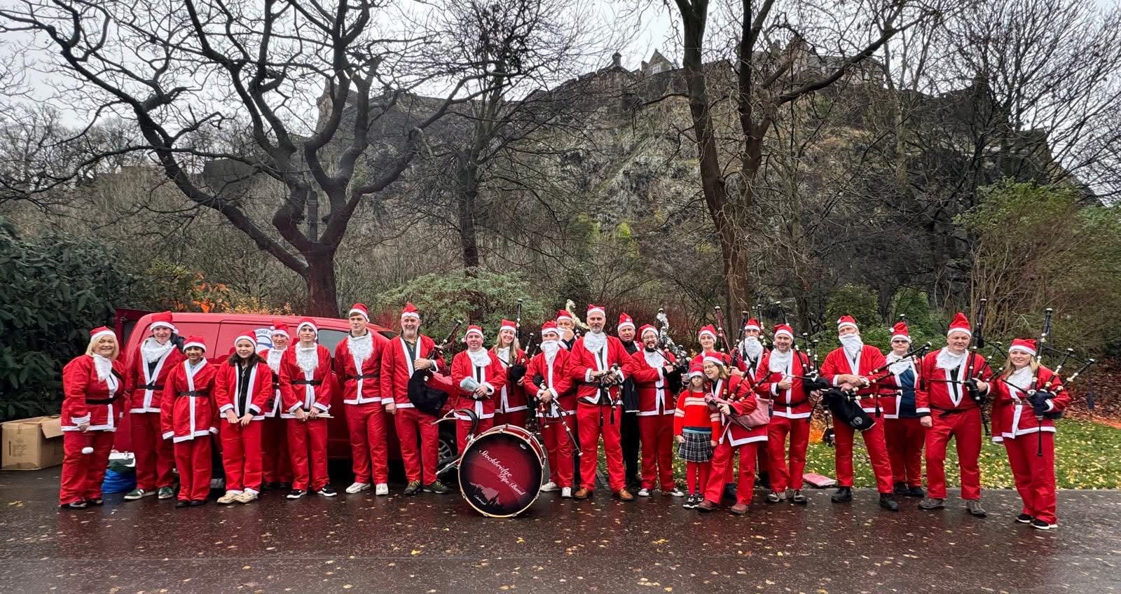 Stockbridge Pipe Band at the When You Wish Upon a Star Santa Run, Princes Street Gardens, Edinburgh