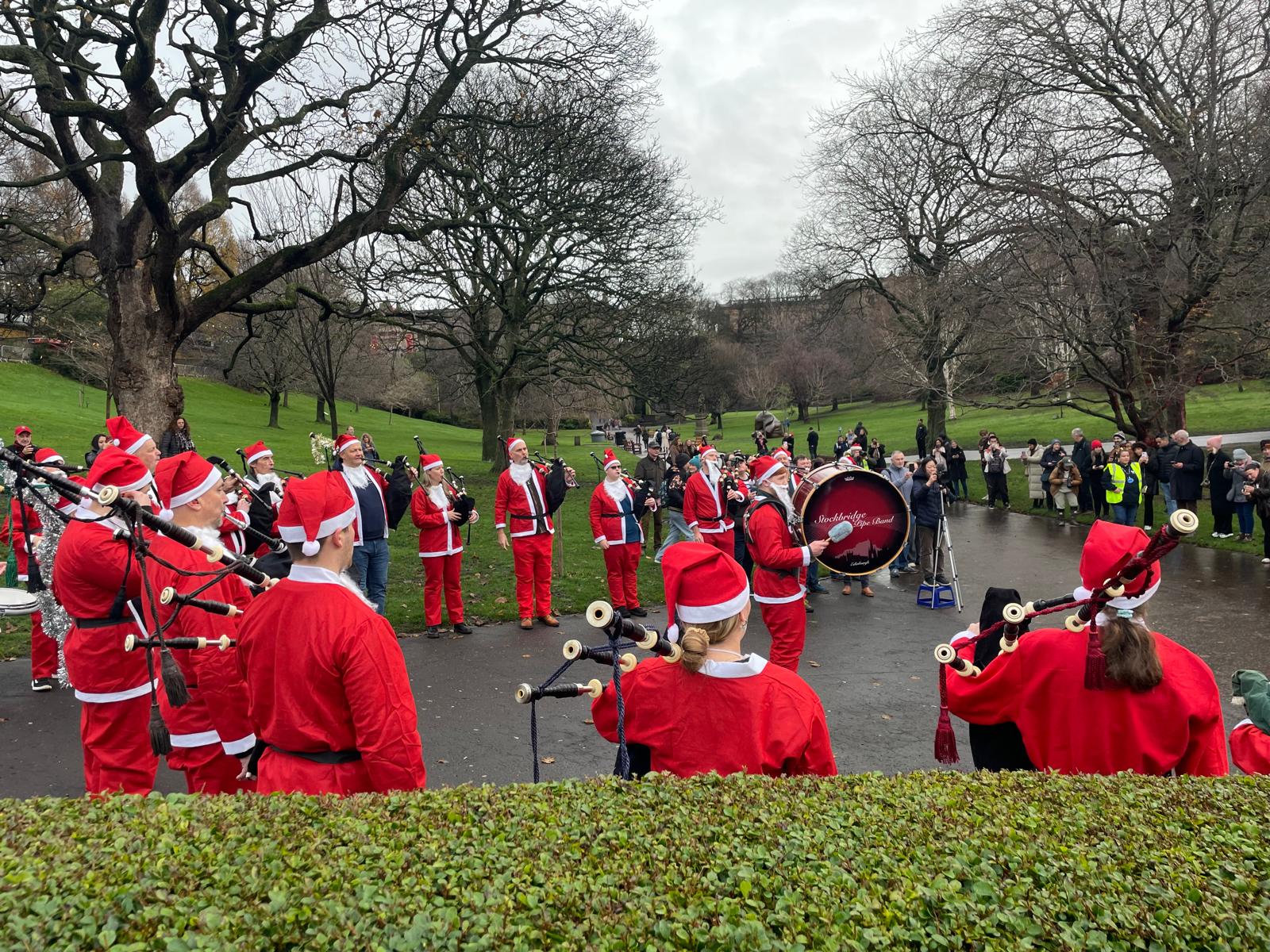 Stockbridge Pipe Band at the When You Wish Upon a Star Santa Run, Princes Street Gardens, Edinburgh
